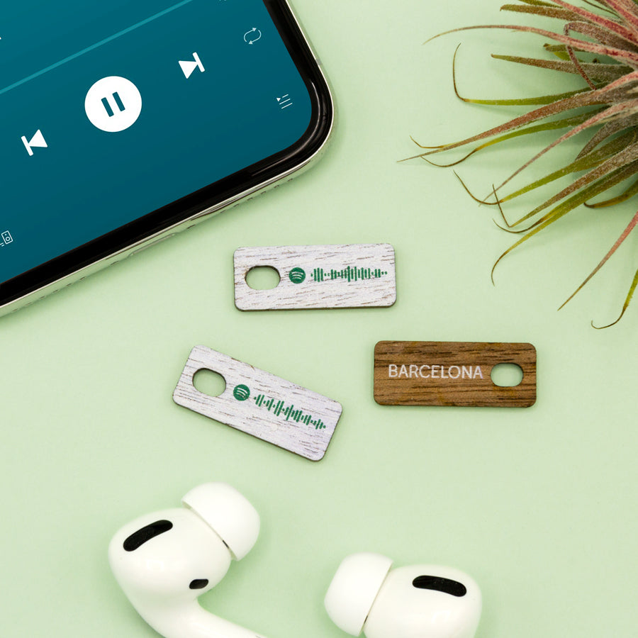 Tag con el código de Spotify para escanear tu canción favorita, mostrando su reverso personalizable